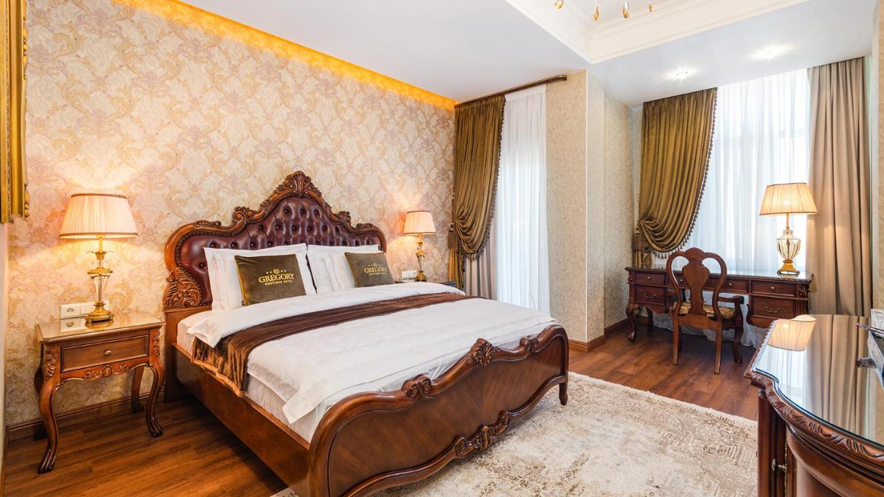 Gregory Boutique Hotel คีชีเนา ภายนอก รูปภาพ A bedroom in the hotel
