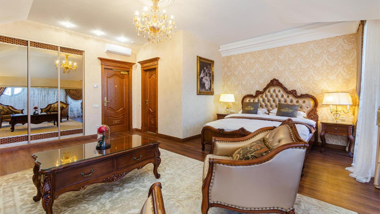 Gregory Boutique Hotel คีชีเนา ภายนอก รูปภาพ A bedroom at the hotel