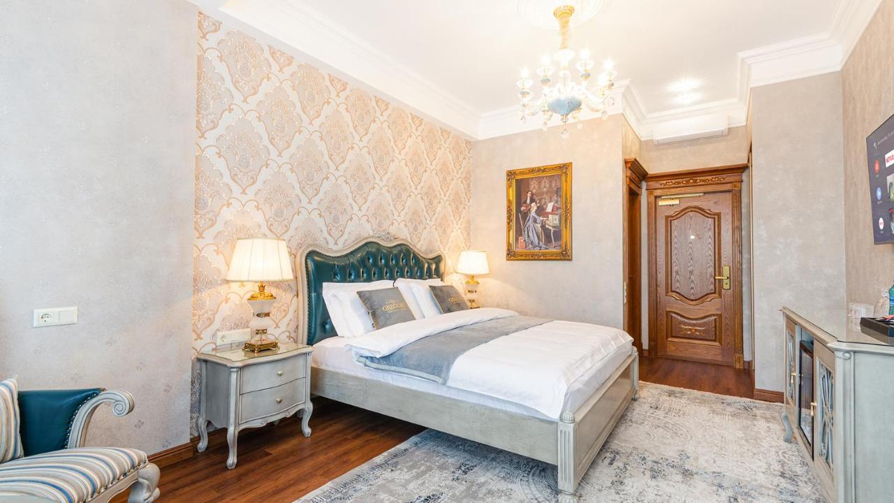 Gregory Boutique Hotel คีชีเนา ภายนอก รูปภาพ A bedroom
